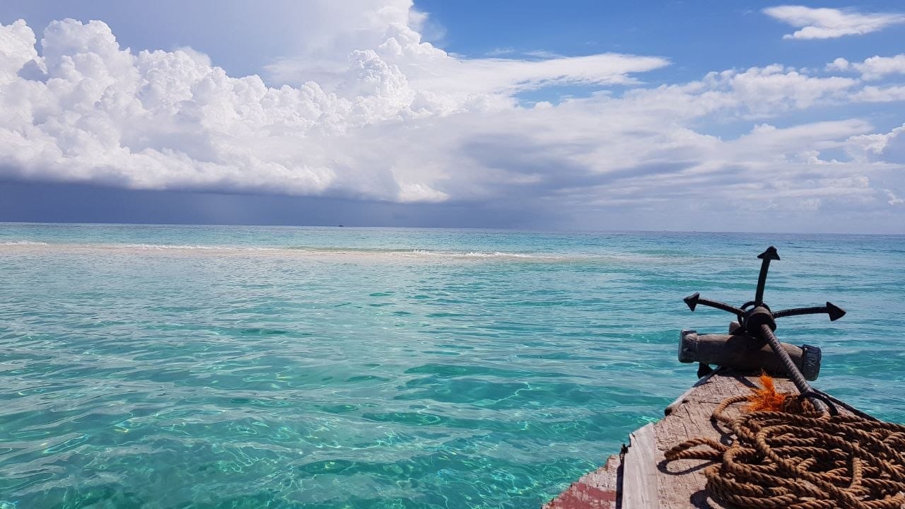 Boat approaching sandbank